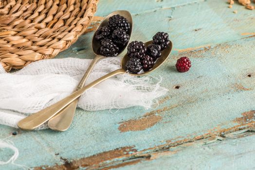 Blackberries in spoons