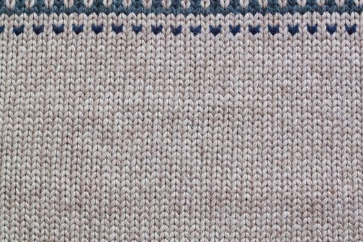 Grey and beige realistic knitting pattern