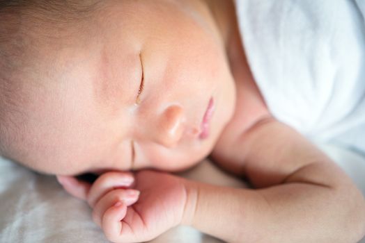 Newborn baby sleeping close up