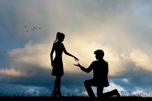 man propose to girl at sunset