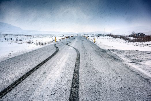 Empty snowy highway