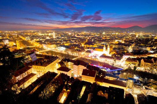 Graz aerial night panoramic view from Schlossberg