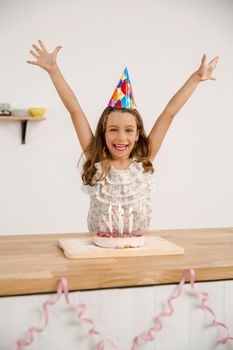 Shot of a happy young girl celebrating her birthday