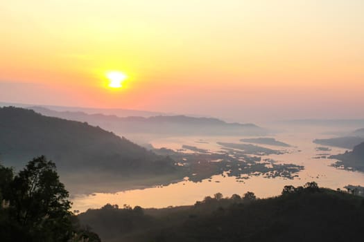 Mountains mist and sunrise view from Phu Huay Isan in Nong Khai,
