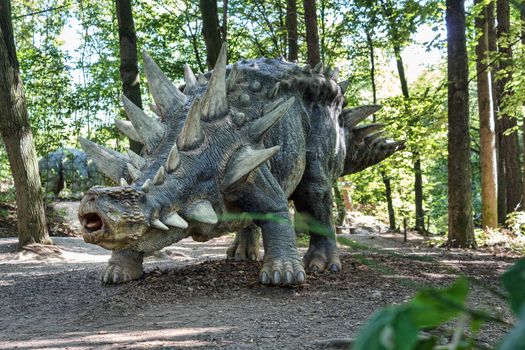 prehistoric dinosaur like stegosaurus in nature