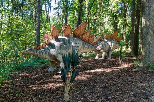 prehistoric dinosaur stegosaurus in nature