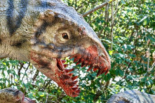 prehistoric dinosaurs raptors attacking its prey