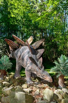 prehistoric dinosaur stegosaurus in nature