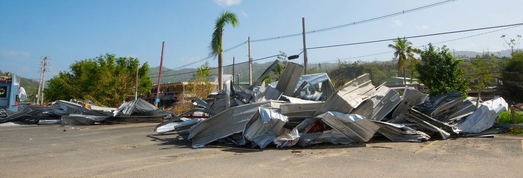 Remains of aluminum roof destroyed by Hurricane Maria outside San Juan.