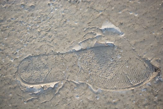 Footstep pattern on a concrete background