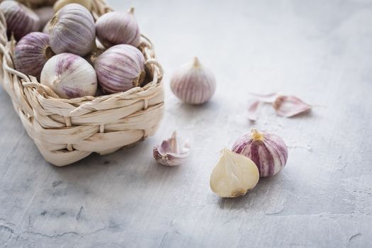Garlic in a basket with a copyspace