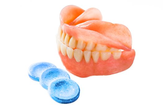 Dentures and three tablet to clean