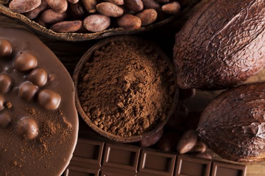 Chocolate sweet, cocoa pod and food dessert background