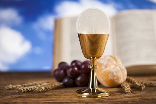 Symbol christianity religion a golden chalice with grapes and br