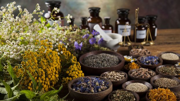 Herbal medicine on wooden desk background