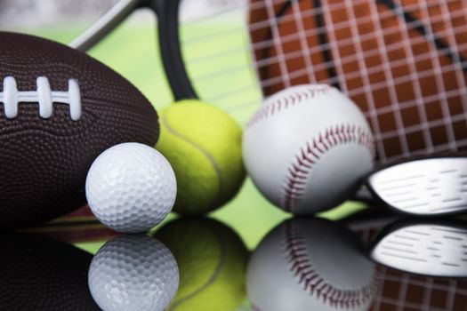 Sports balls with equipment 