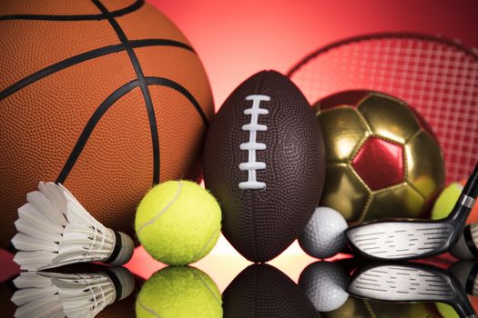Sports balls with equipment 