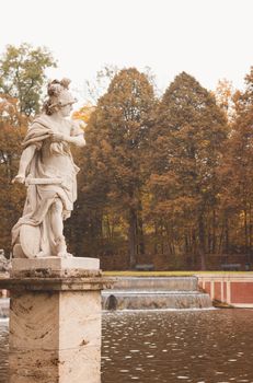 The Satue in the Bavarian Castle Nymphenburg Park, autumn landscape