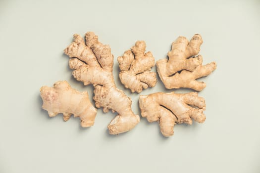 Ginger root on concrete background