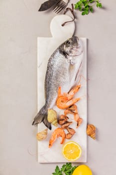 Seafood on grey concrete background