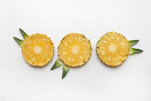 Slices of pineapple with leaf isolated.