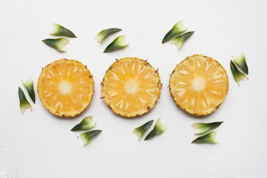 Slices of pineapple with leaf isolated.