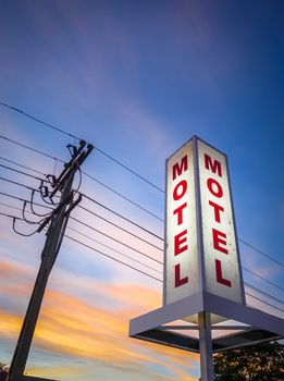 Vintage motel sign at sunset 