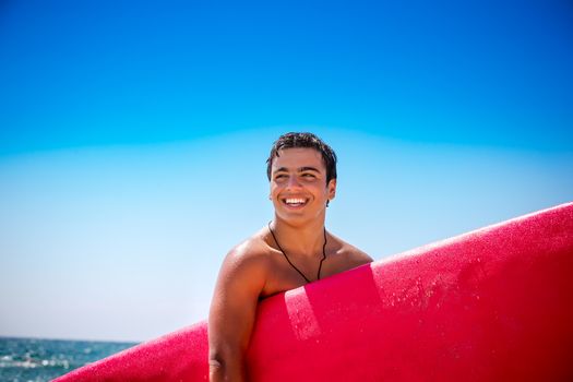 Happy boy enjoying surfing