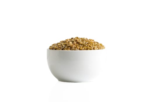 Brown freekeh in a cup