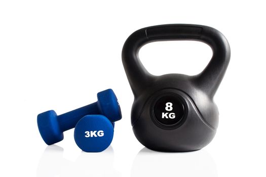 Kettlebell and dumbbells for a gym training