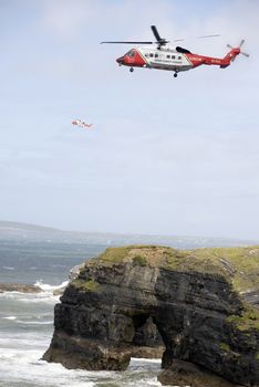 two irish search and rescue helicopters at the virgin rock