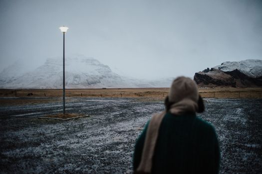 Person on a parking lot in Iceland
