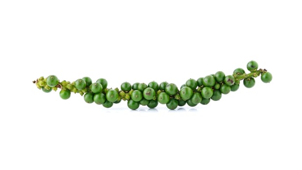 green peppercorns isolated on white background
