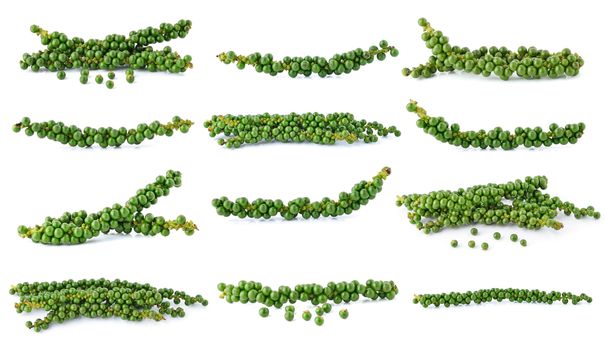 green peppercorns isolated on white background