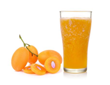 Sweet Marian plum juice on white background