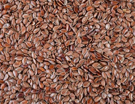 Flax seeds heap background