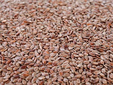 Flax seeds heap background