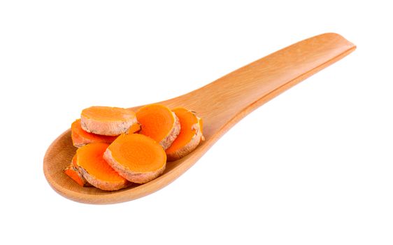 turmeric in a wood spoon on white background