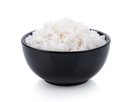 rice in black bowl on white background