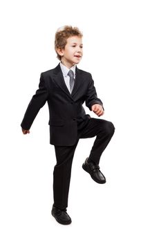 Smiling businessman child boy walking for next achievement step