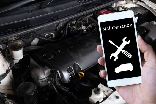 Car engine room and mobile maintenance program.