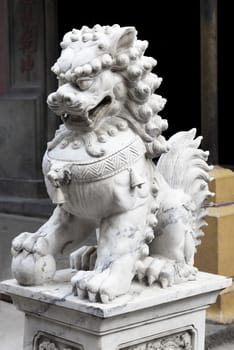 Chinese lion at the entrance of a temple