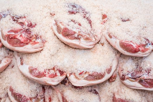 Salting process of iberian ham. Meat industry concept.
