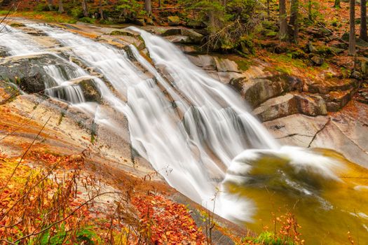 Mumlava waterfall in autumn, Harrachov, Giant Mountains, Krkonose National Park, Czech Republic.