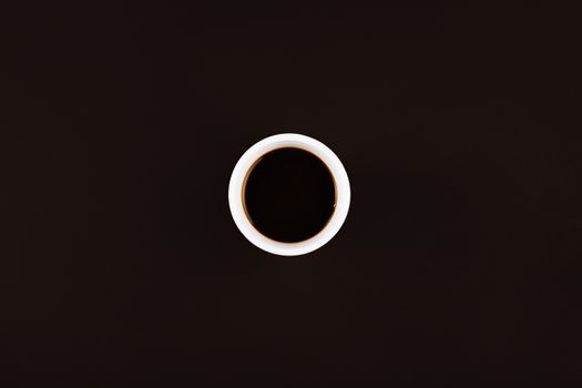 Dark coffee on dark background