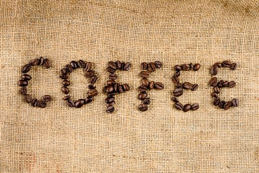 Coffee written with coffee beans