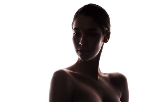 silhouette of young adult woman with clean fresh skin