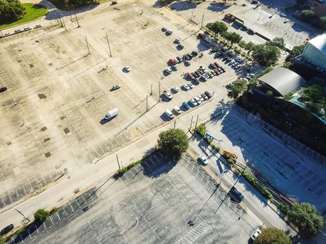 Top view vacant uncovered parking lots in downtown Dallas