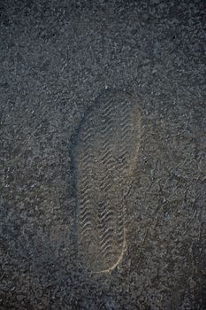 Footstep pattern on a concrete background
