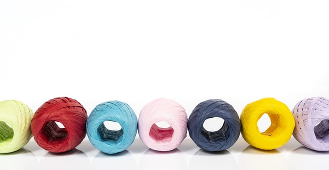 Balls of colored raffia